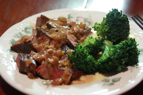 Steak with whiskey cream sauce and broccoli