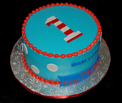 blue and red first birthday cake for a Dr Seuss themed celebration