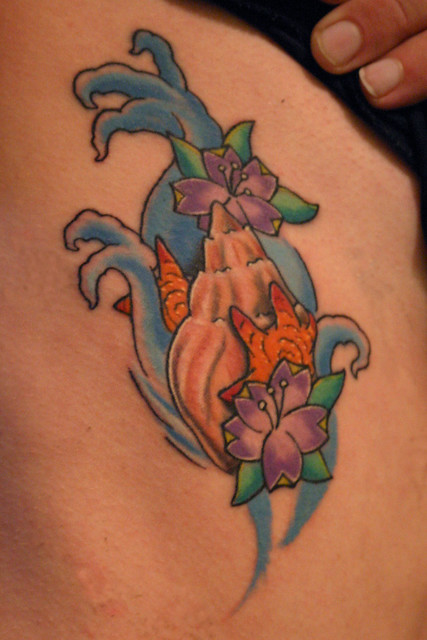 conch shell tattoo. Tattoo was done by Crutch @ Tattoo Boogaloo, 