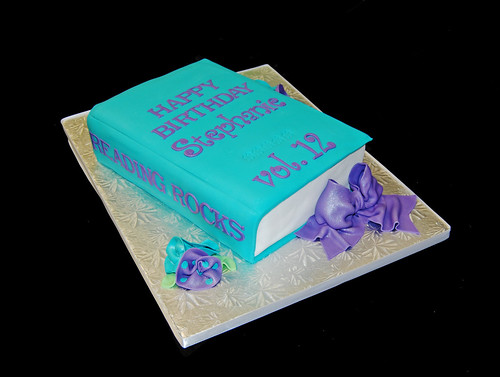 turquoise and purple 3D book cake for a 12th birthday