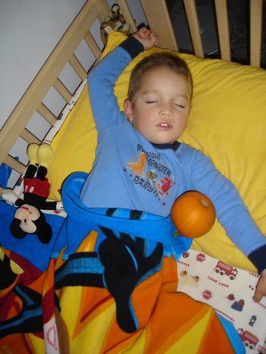 Ethan Sleeping with his pumpkin