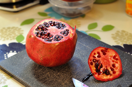 Step 1, slice the head off of the pomegranate