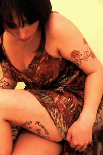 flower tattoo on thigh. Flower Tattoo on Thigh and Arm Woman