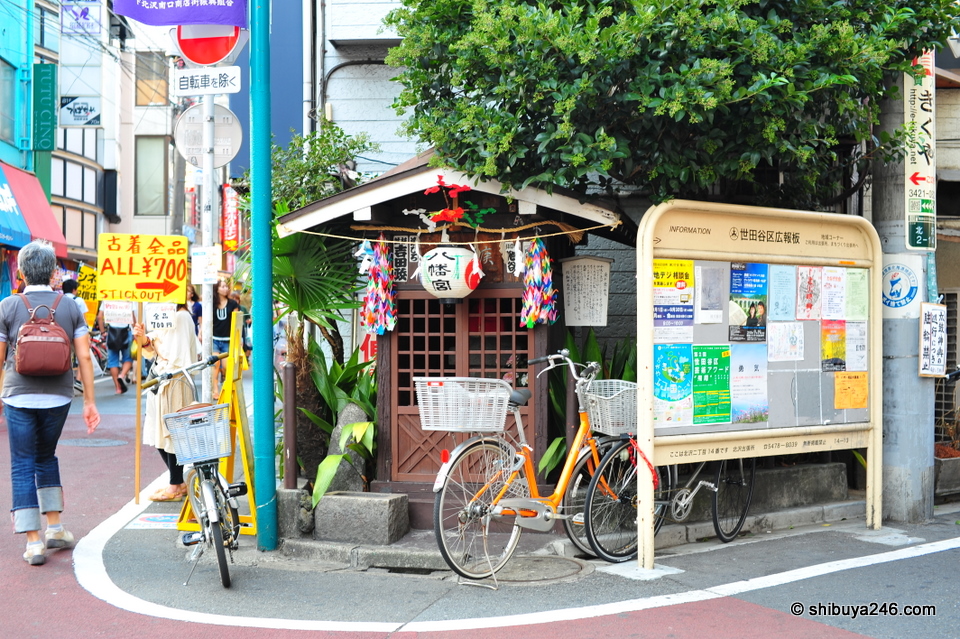 Small shrine in the busy street area