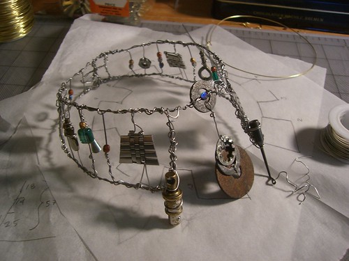 Collar made from stainless steel wire, glass beads, and found objects
