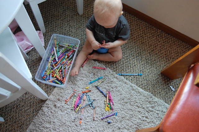 sneaking his sister's crayons