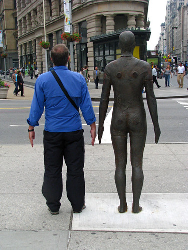 Clothed man with naked man