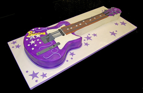5th birthday purple guitar cake for a rock star themed celebration