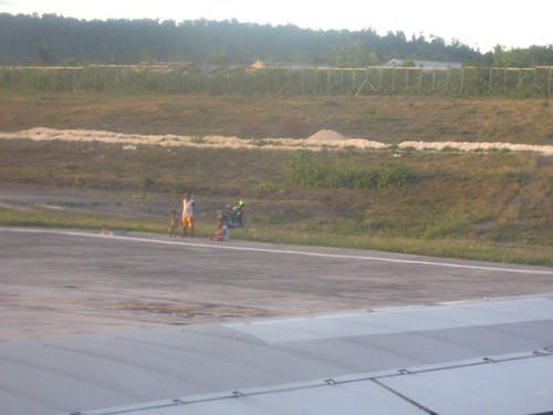 Local residents picnicing on the runway, Biak Airport, Papua