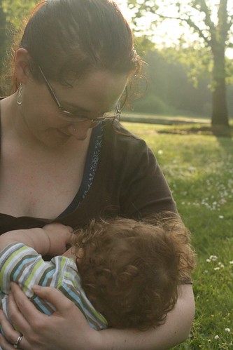 breastfeeding on the grass 11 months