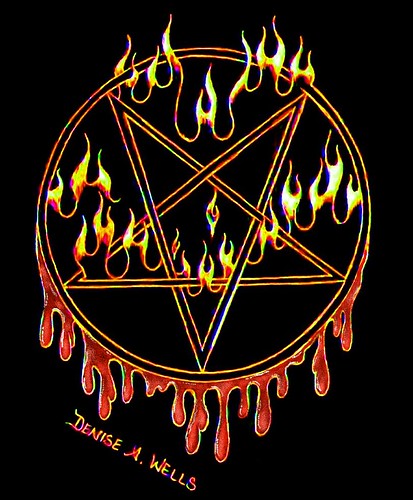 A wicked pentagram tattoo design with flames and blood drippings.