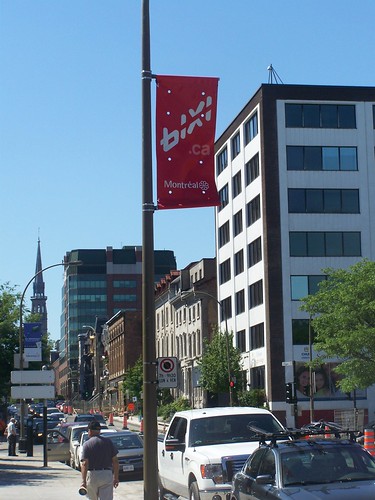 A street banner promoting the Bixi bicycle sharing program in Montreal