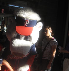 Megan lurking behind Paws, one of the mascots