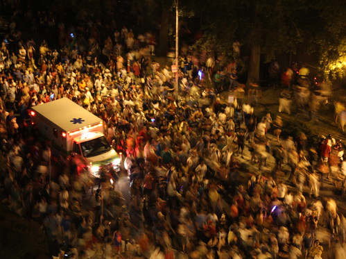 ambulance drowning among a sea of people