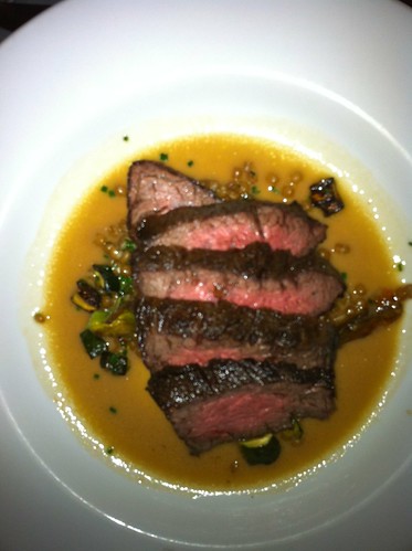 Pan Roasted Bavette Steak with Squash Blossoms, Basil, Wheat Berries and Parmesan Jus