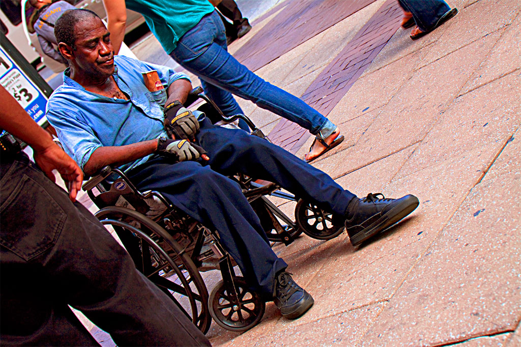 Man-in-wheelchair,-with-Wawa-cup--Center-City
