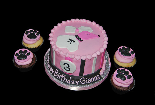 Black and Pink Poodle Cake with Paw Print Cupcakes for a 3rd Birthday celebration