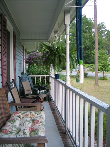 New chairs and table on porch