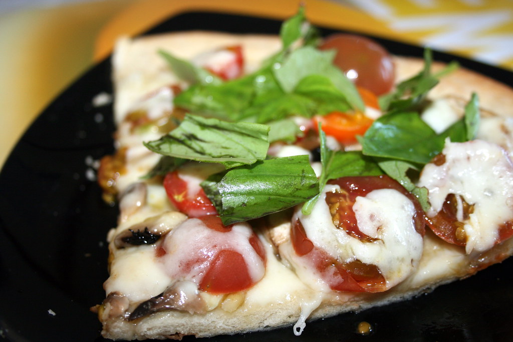 Mushroom, heirloom tomato and basil pizza
