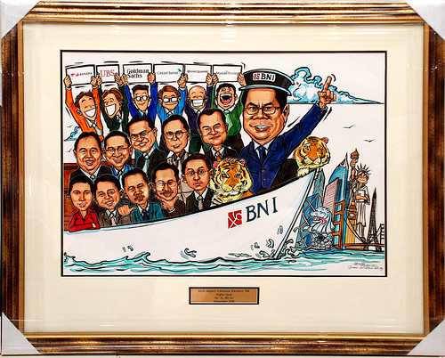 Group caricatures for Goldman Sachs with metal engraving in frame