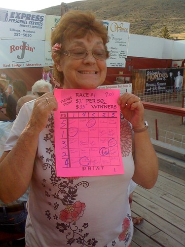 Carol was the lucky one in the first race with the fleet footed Louie Luau pig - winings . . . $25 on a $2 bet.