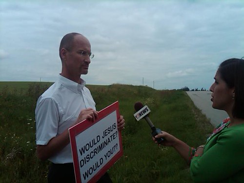 Bob Werner, a pro-equality supporter, being interviewed in Rochester, MN
