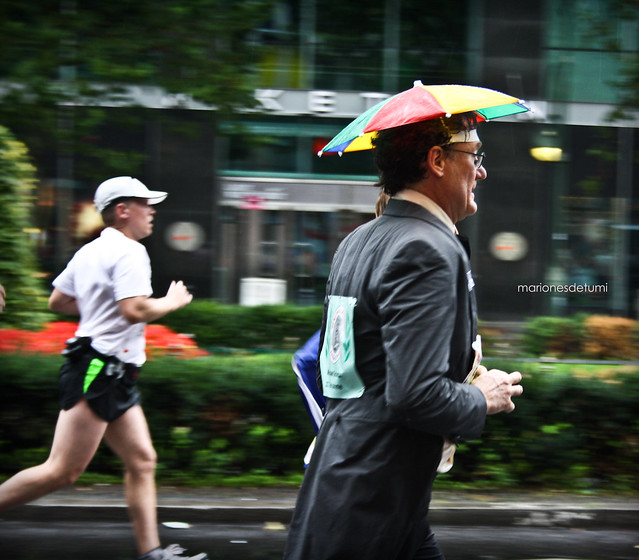 running umbrella man
