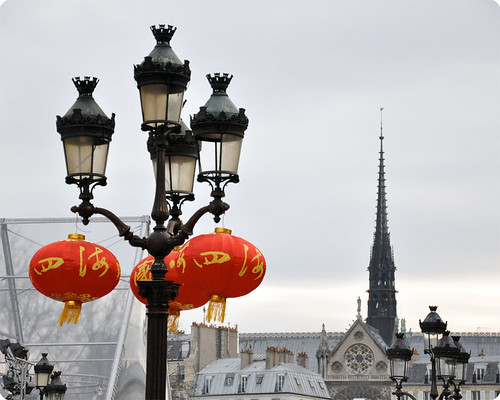 Red lanterns face to Notre Dame