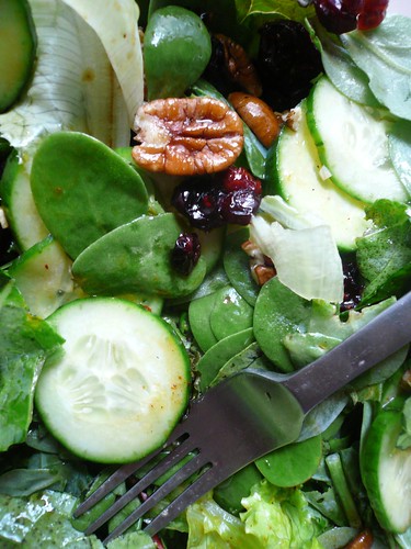 A salad with nuts and purslane