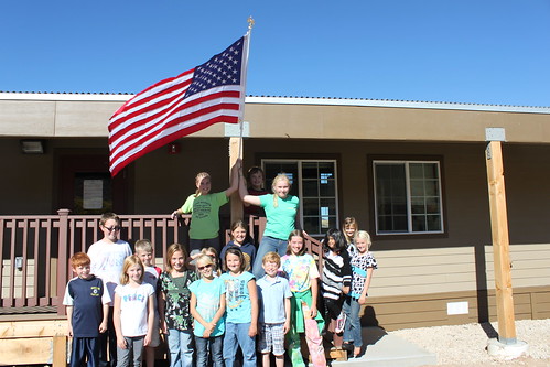 “Green Student Council” after posting flag to the new classroom building