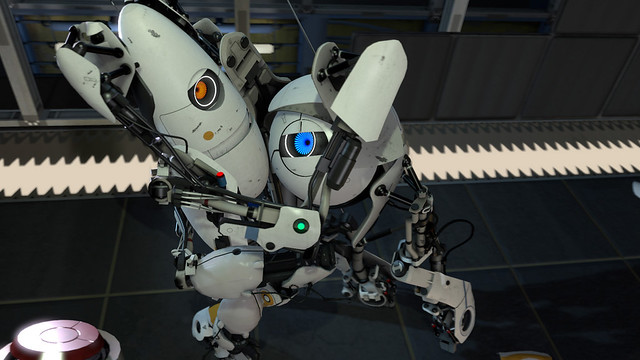 Portal 2 robots cooperativo abrazo