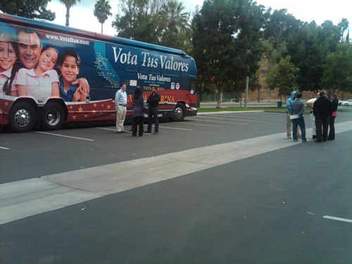 Empty parking lot at the Riverside stop with the Vota Tus Valores bus