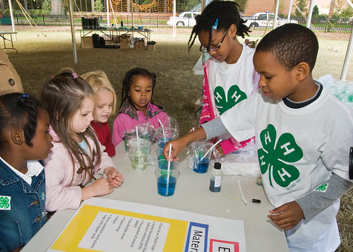 Charles Johnson and Alyssa Campbell fifth grade students demonstrate the effects of carbon dioxide on the atmosphere and what we can do to replace our carbon footprint at Hearst Elementary School in Washington, DC. The experiment was part of the 4-H National Youth Science Day, National Science Experiment, 4-H2O, Tuesday, October 6, 2010.