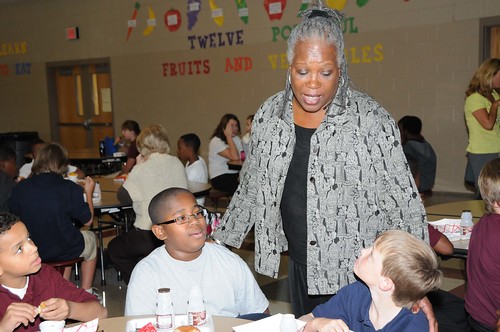 FNS Deputy Administrator for Special Nutrition Programs Audrey Rowe talks with Byram Middle School students during their lunch period following a ceremony in which their school received a HealthierUS School Challenge Gold Award on Oct 14.