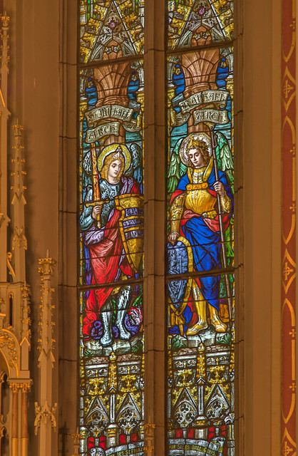 Saint Francis de Sales Oratory, in Saint Louis, Missouri, USA - detail of stained glass windows of Saints Michael and Raphael, Archangels