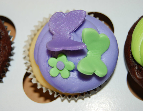 Green and Purple Cupcakes for a Tinkerbell party - topped with butterflies and flowers