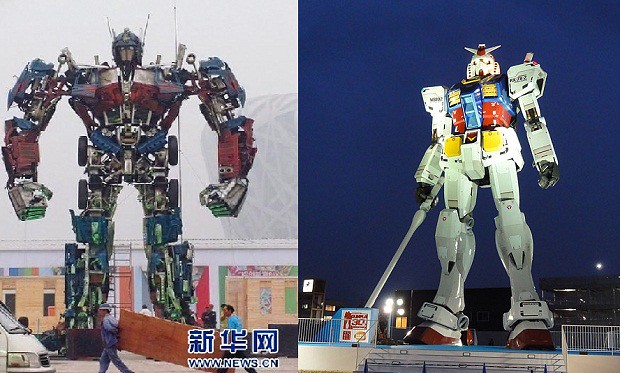 Optimus Prime statue versus Gundam