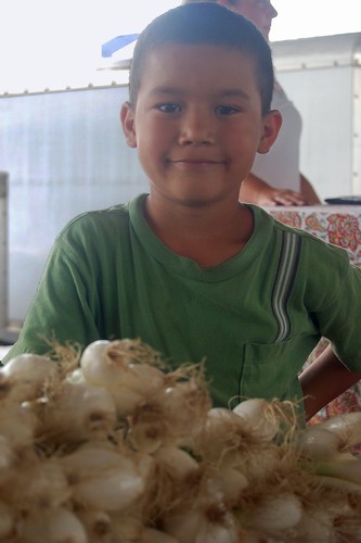the hard, little worker who sold me green onions