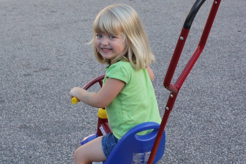 Catie on her tricycle