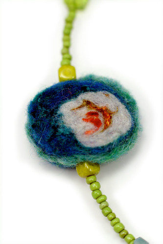blue felted bead close up