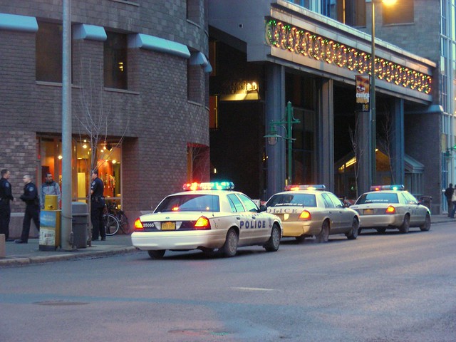 APD officer and cars at the Performing Arts Center, downtown Anchorage