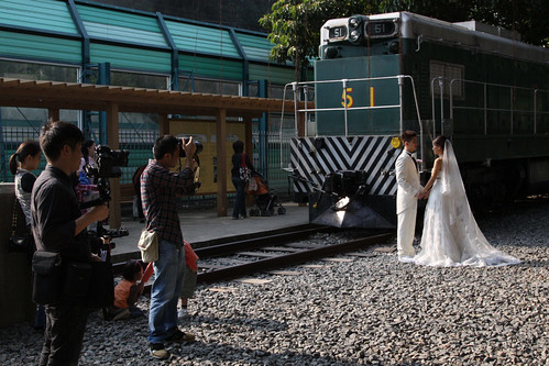Doesn't every little girl want their wedding photo to be in front of an EMD G12 diesel-electric locomotive?