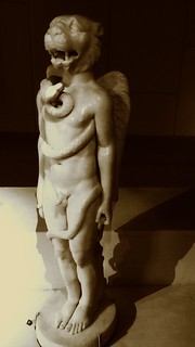 Mithraism....Lion-headed figure from the Sidon Mithraeum. Dedicated 500 CE by Flavius Gerontios (CIMRM 78 & 79), now at the Louvre... the souls are elicited in flames by the caduceus