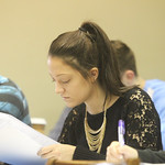 A student reviewing her notes