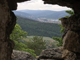 Landscape captured through the hole in Chojnik Castle wall