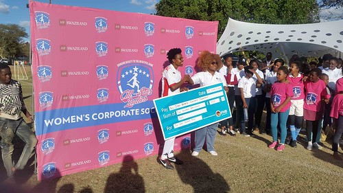 Sasha Goening receiving the top goal scorer award from FNB who were part of the sponsors of the tournament