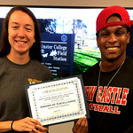Laura Page and Terrell Cleckley holding the BEA Student Video Excellence Award certificate