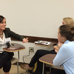 Students talk with an alumna at the Professional Networking Symposium