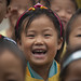 North Korean young girl smiling in a school, South Hamgyong Province, Hamhung, North Korea
