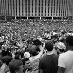Wolfpack fans gather on the Brickyard to celebrate and honor the men's basketball team winning the 1983 ACC Tournament championship. 几周后，这支球队最终赢得了NCAA的冠军. (©1983 Roger Winstead)